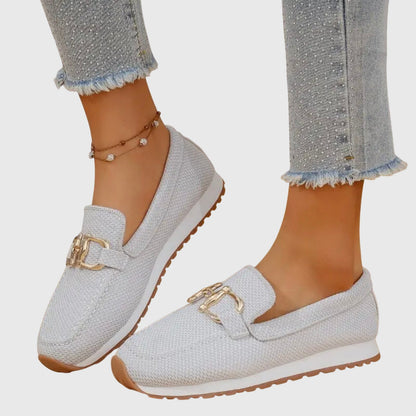 White orthopedic mesh loafers with gold buckle bit and brown-trim sole