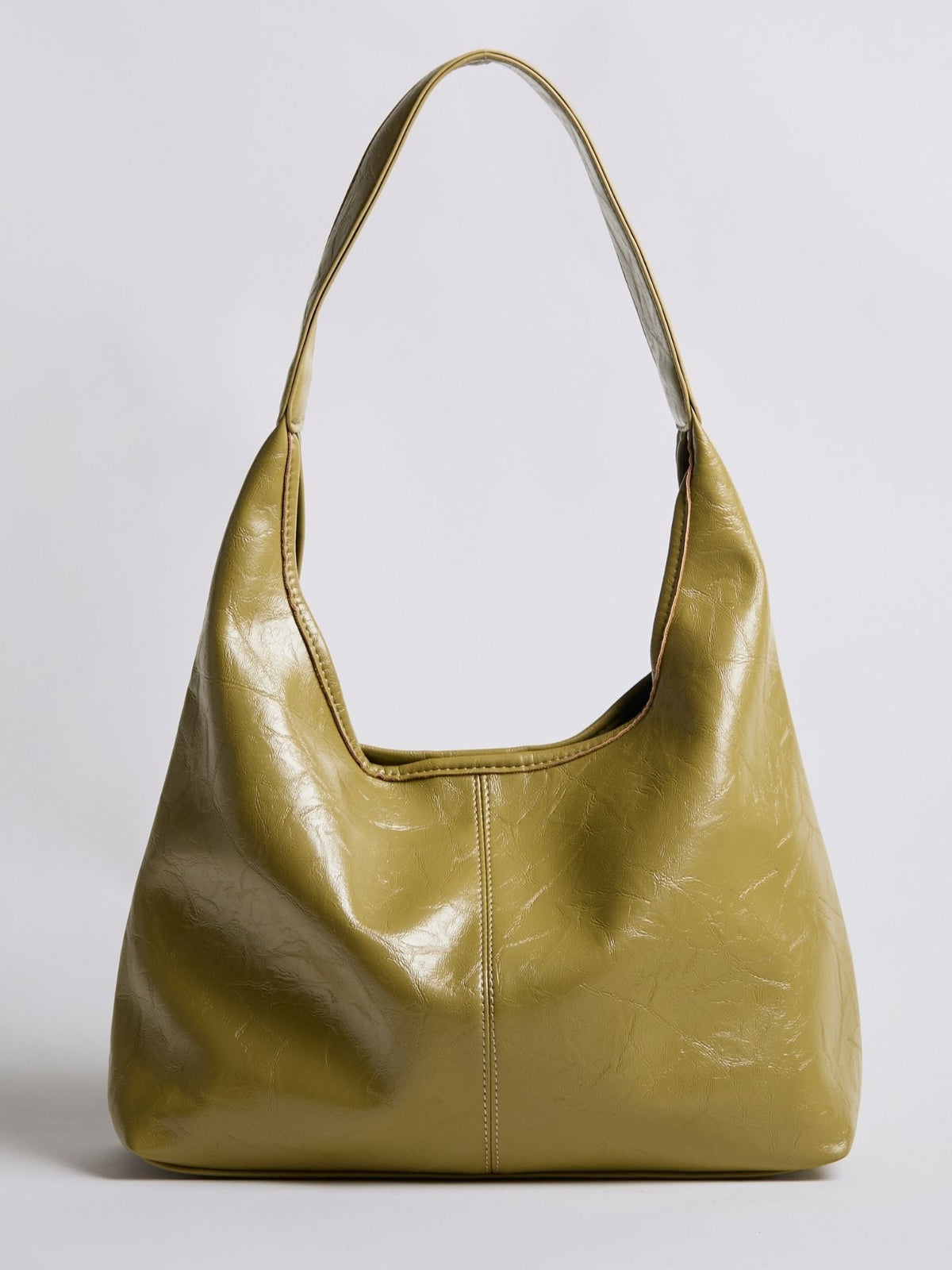 Olive gold distressed vegan leather tote bag with U-shaped opening and top handles.