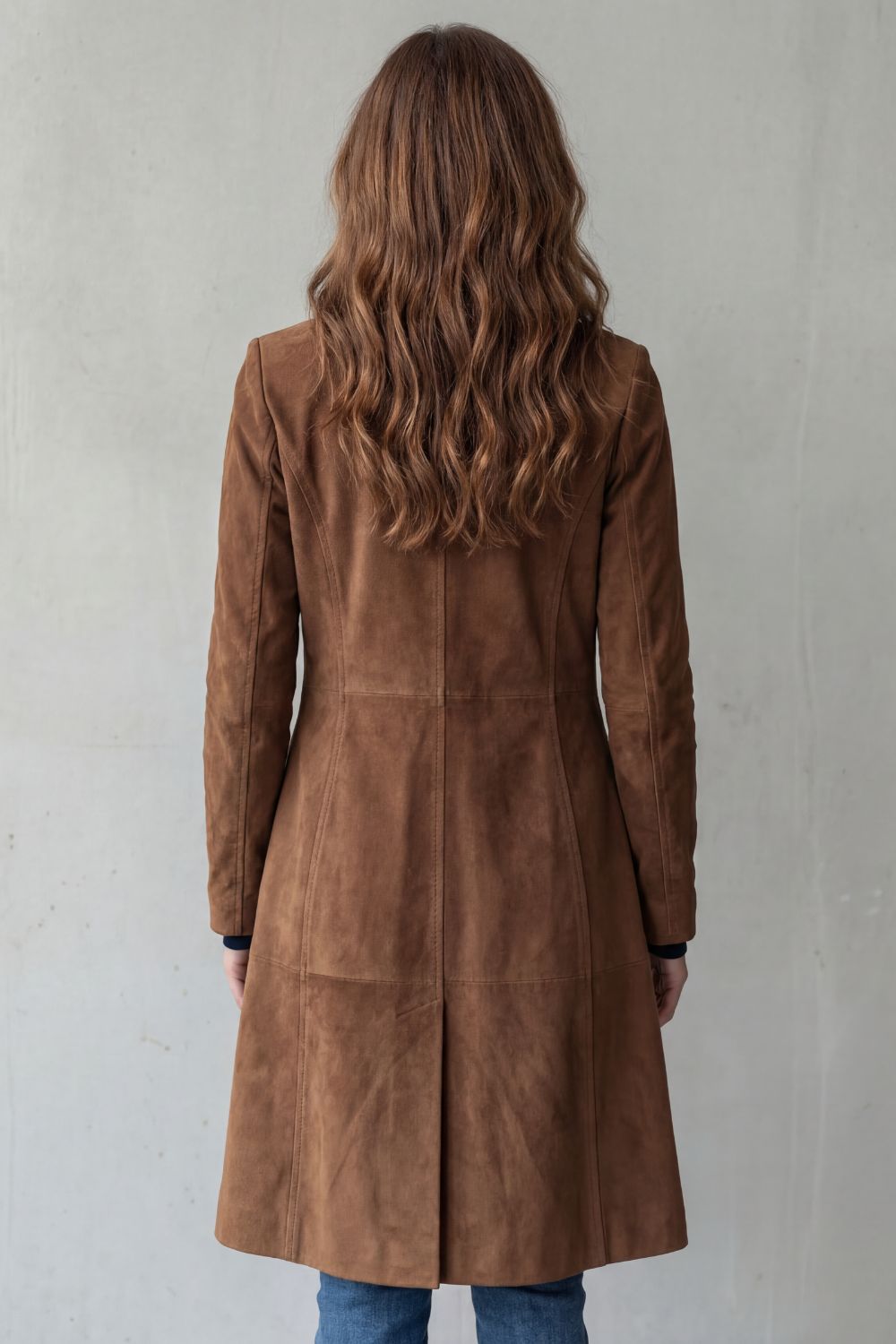 Brown suede longline coat, back view, center back panel and seam detailing.
