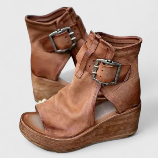 Brown orthopedic wedge sandals with two adjustable buckle straps and open-toe design