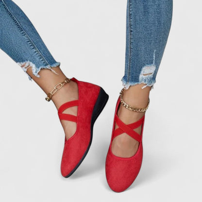 Red orthopedic Mary Jane wedge shoes with ankle strap and chain bracelet detail