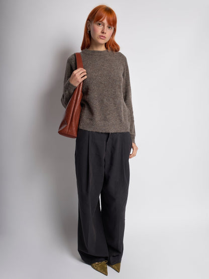 Distressed vegan leather tote bag in brown with front zip pouch pocket