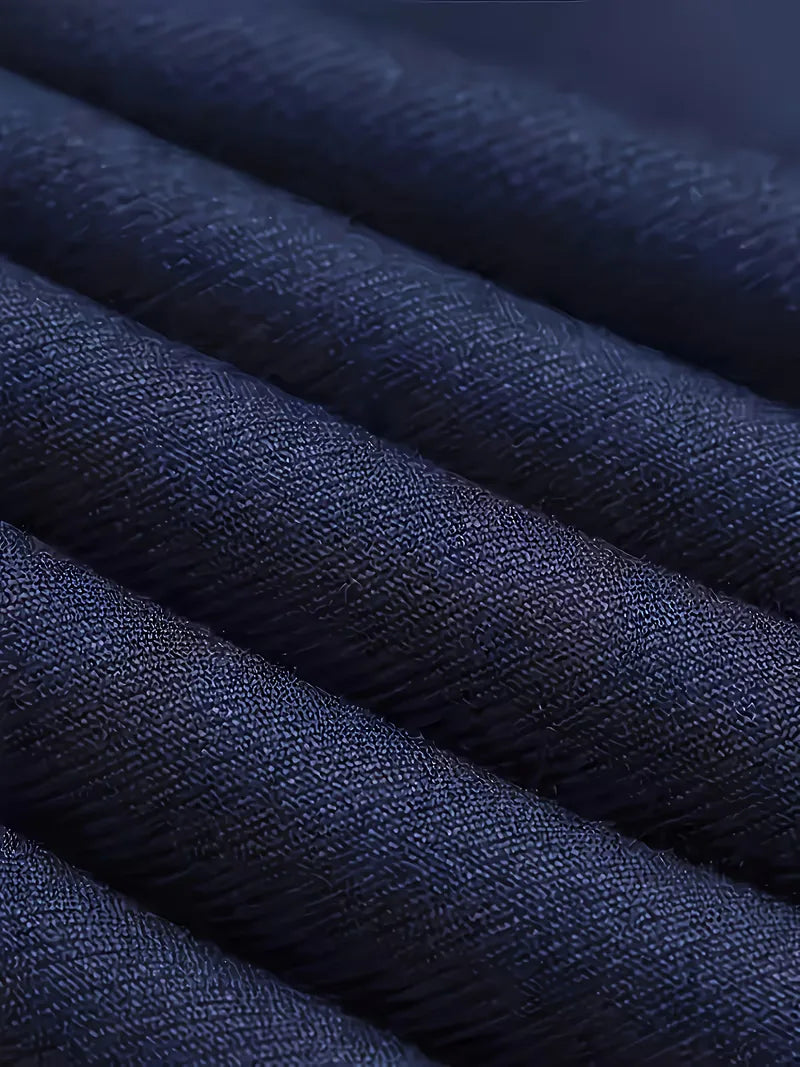 Navy suit fabric close-up showing textured weave