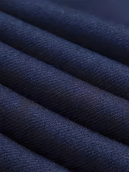 Navy suit fabric close-up showing textured weave