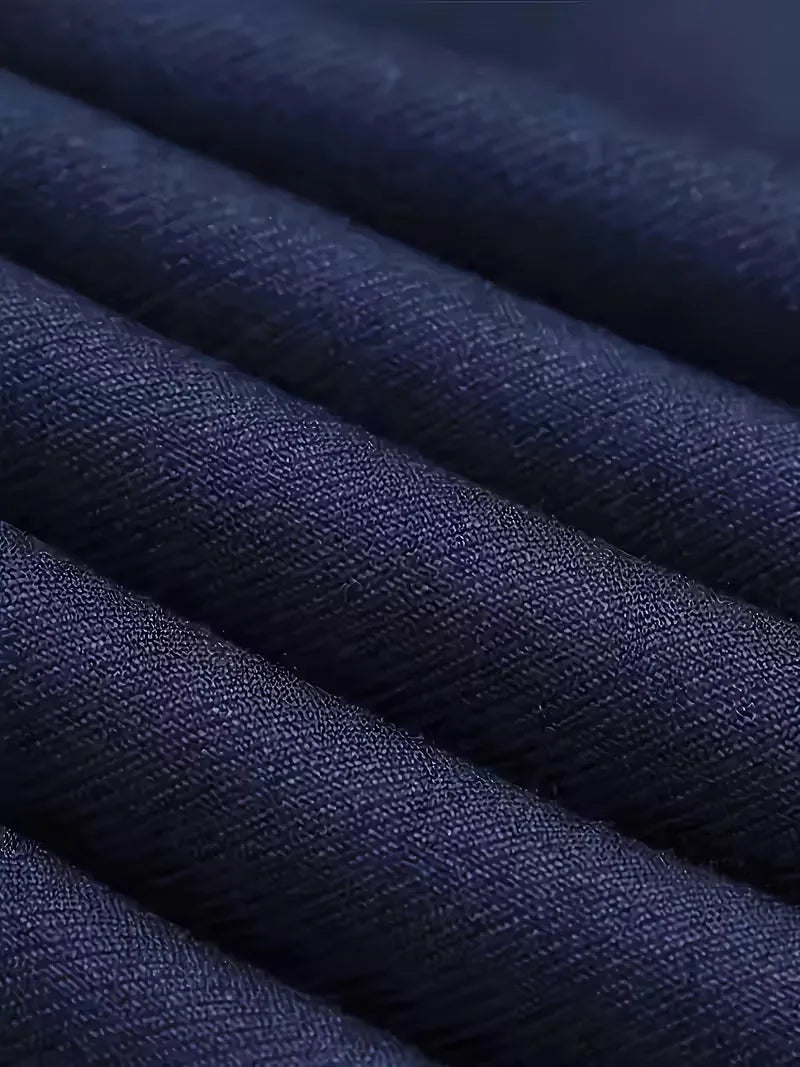 Navy suit fabric close-up with subtle woven texture