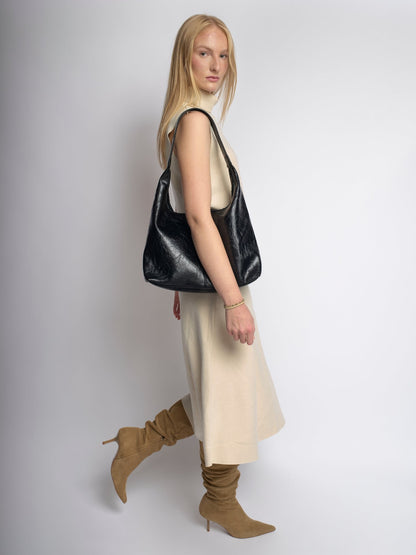 Black distressed vegan leather tote with short handles, hobo shape