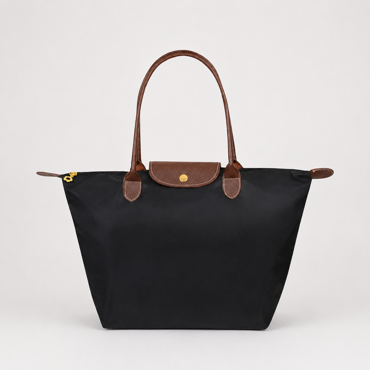 Structured shoulder tote bag with top handles, front flap, and gold clasp, dark black