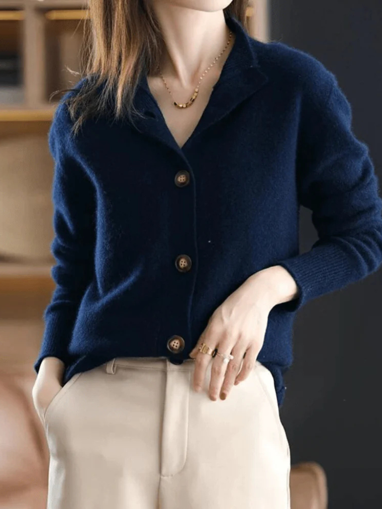 Blue button cardigan with notch collar and three front buttons, long sleeves