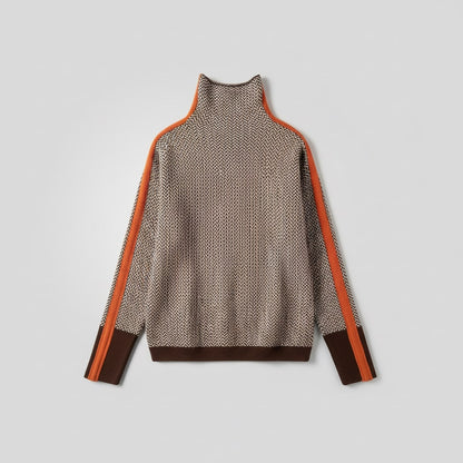 Chevron knit turtleneck sweater with contrasting orange sleeve stripes, front view