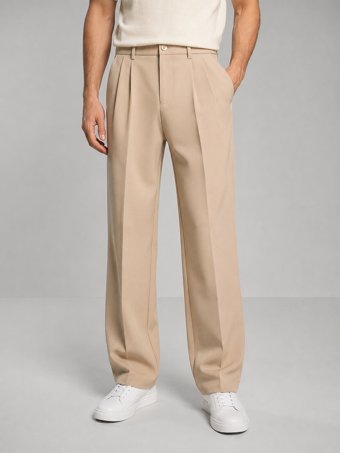 Beige tailored straight-leg trousers with belt loops, button waist, side pockets.