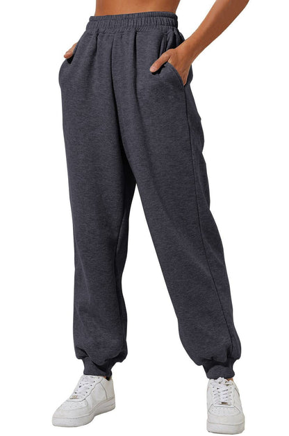 Charcoal grey casual sweatpants joggers with elastic waistband and cuffed ankles
