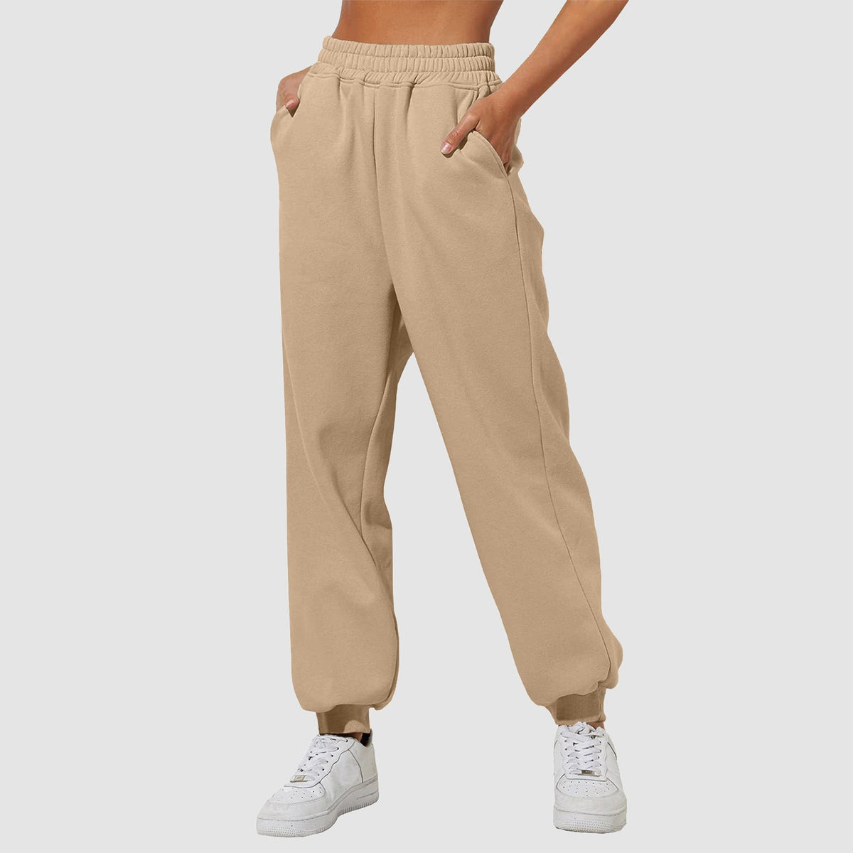 Light beige casual sweatpants joggers with elastic waistband and tapered cuff hem