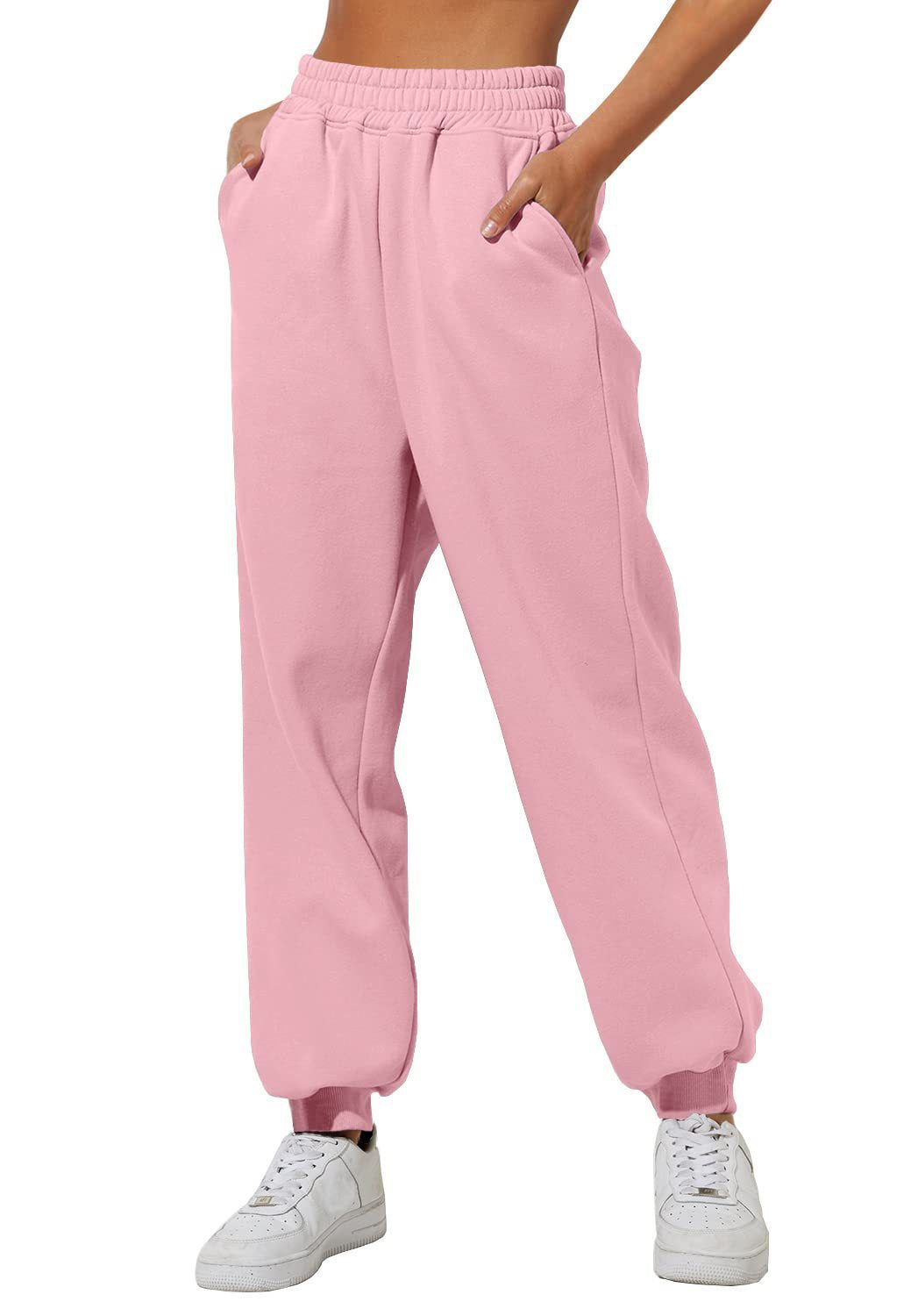 Light pink sweatpants joggers with elastic waistband and cuffed ankle hem.