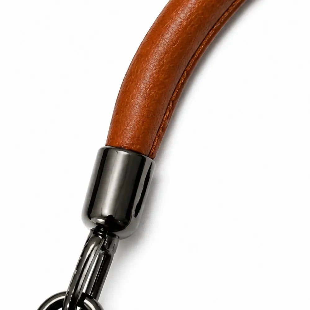 Cognac brown leather crossbody handle with silver-toned hardware connector