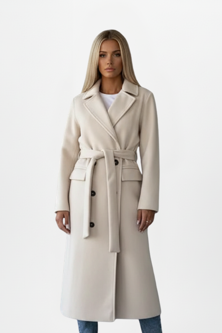 Women’s long cream coat with waist belt and double-breasted button front, relaxed fit