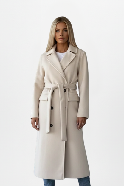 Women’s long cream coat with waist belt and double-breasted button front, relaxed fit