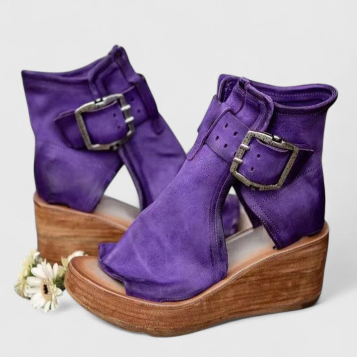 Purple orthopedic wedge sandals with two adjustable buckle straps, open-toe design