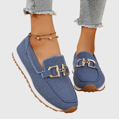 Blue orthopedic mesh loafers with gold buckle detail and cushioned sole