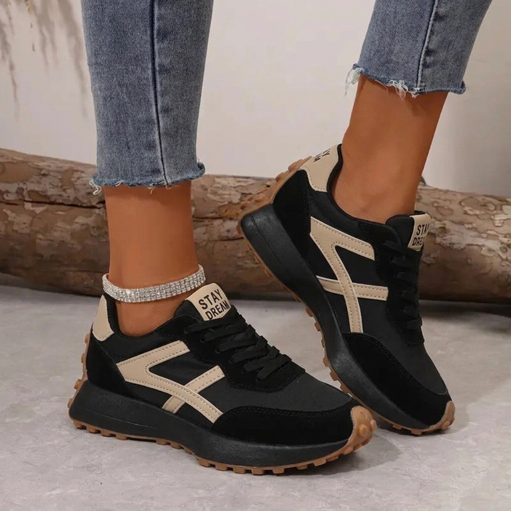 Orthopaedic comfort trainers in black with beige side panels and chunky tread sole