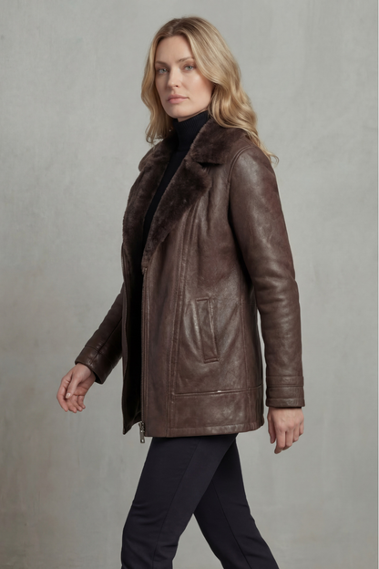 Brown shearling-lined leather jacket with zip front, angled side view, long sleeves
