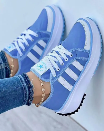 Blue comfort trainers with light-blue stripes and cushioned white midsole