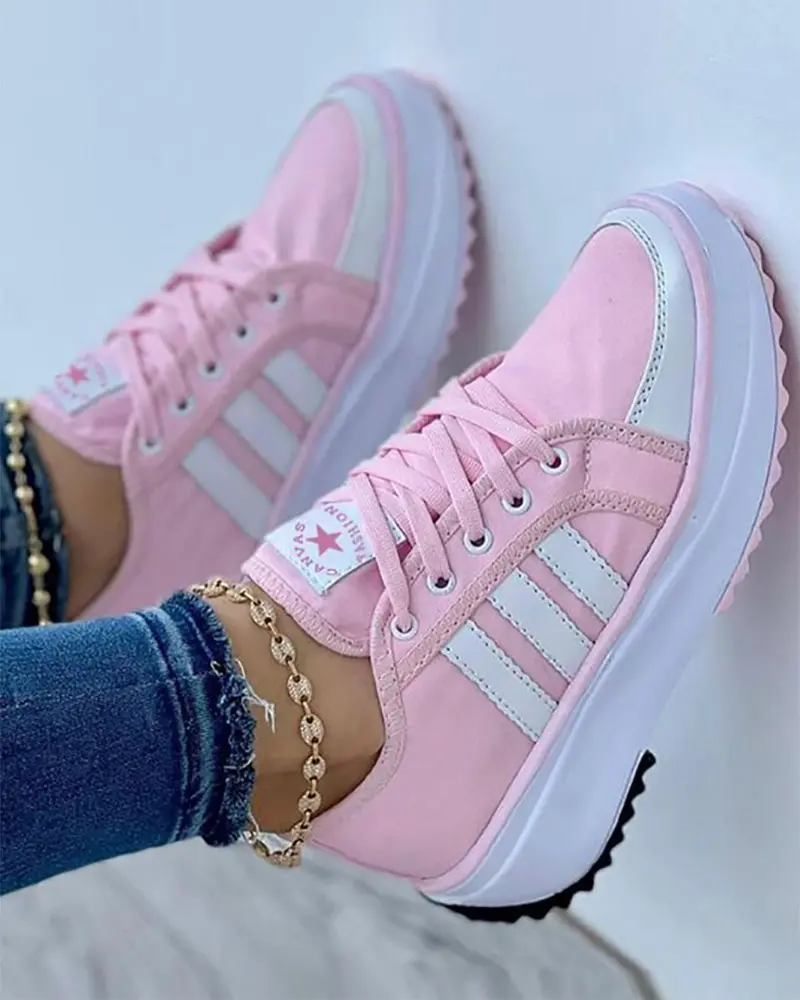 Pink comfort trainers with pale stripes and cushioned white midsole