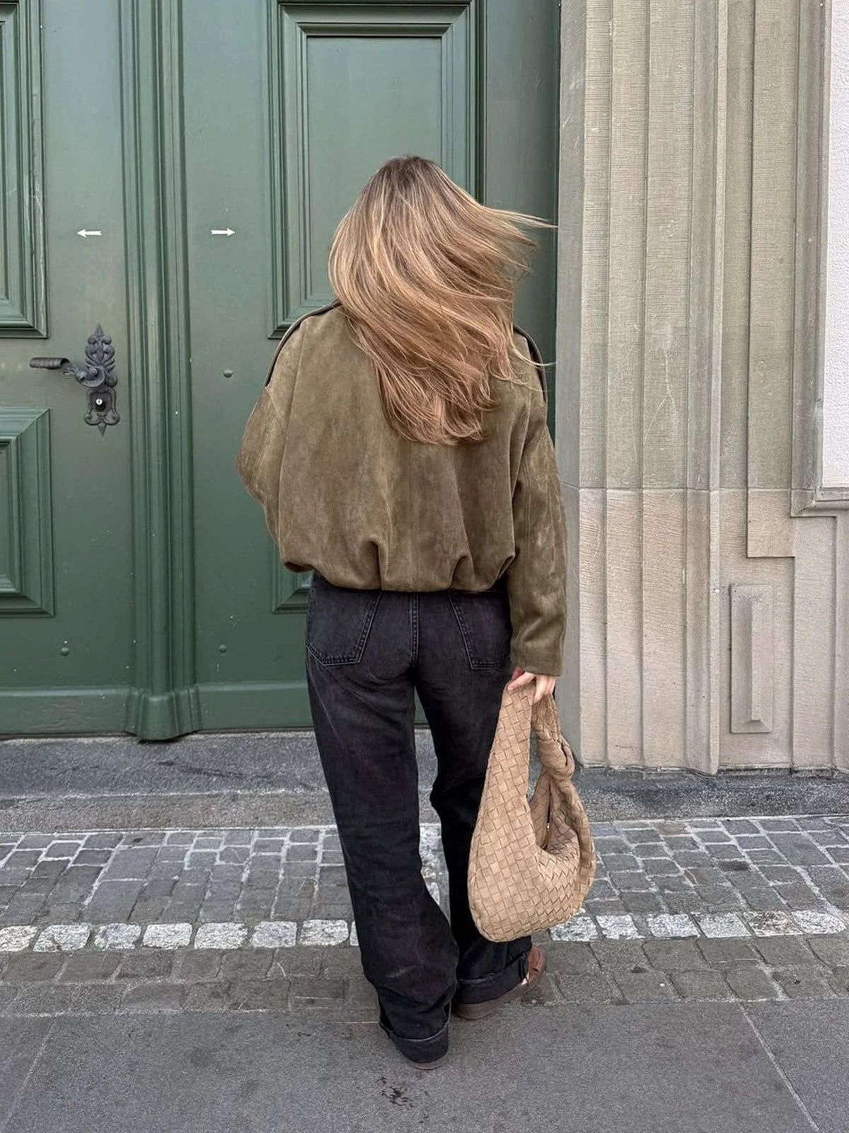 Women’s faux suede bomber jacket, olive green, back view with wide sleeves