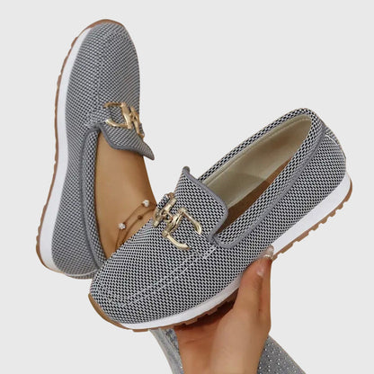 Grey mesh loafers with gold buckle detail and rounded toe slip-on style