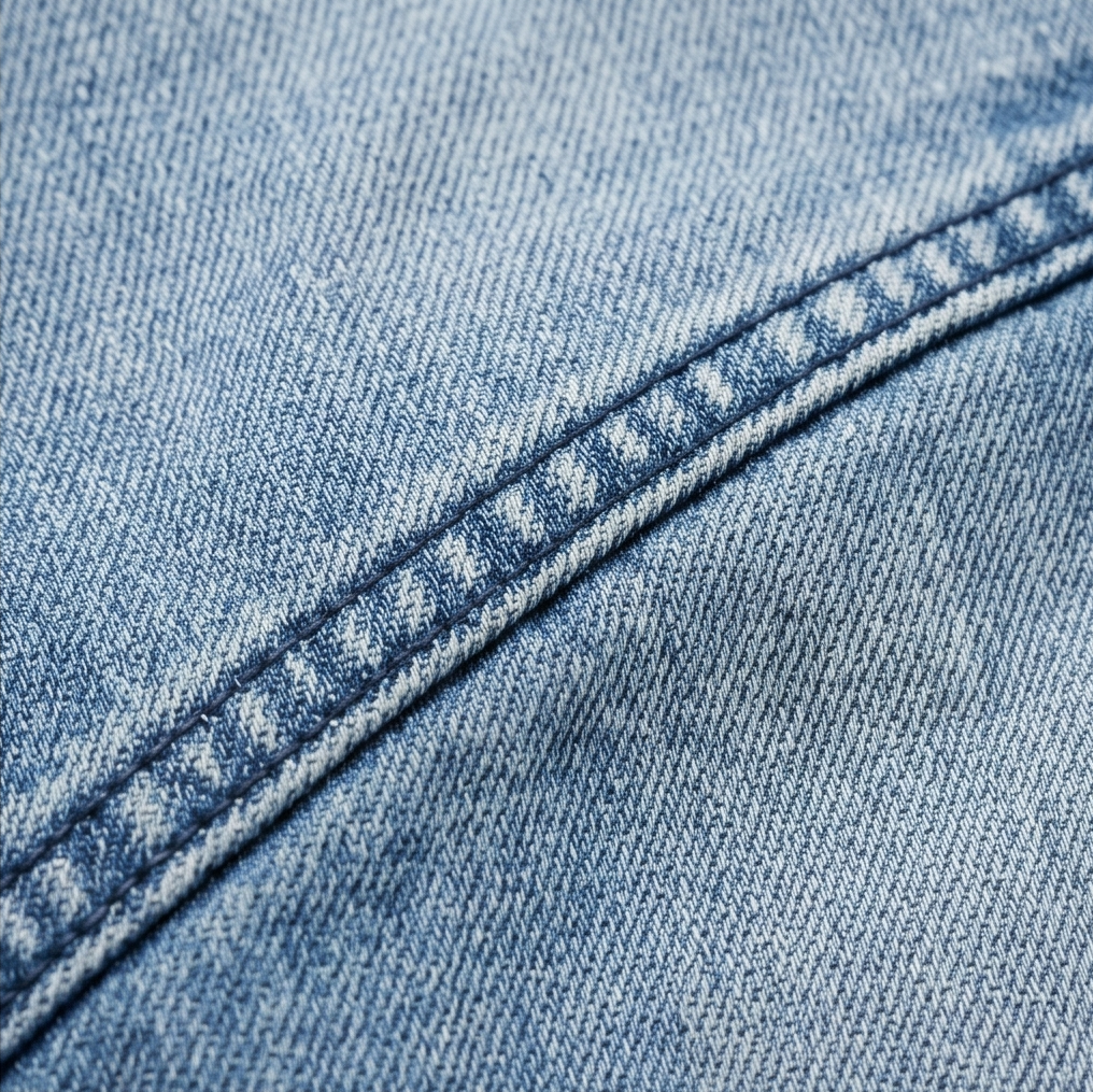 Women's cropped barrel jeans in light blue denim with topstitched seam detail