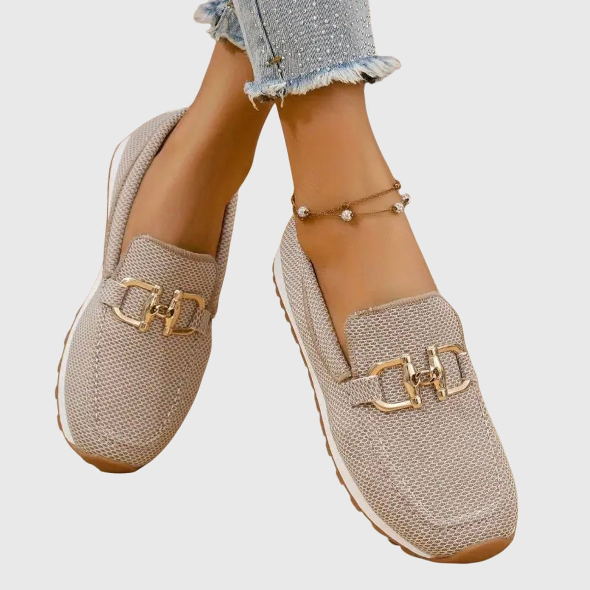 Beige woven slip-on loafers with gold buckle ornament and comfort outsole