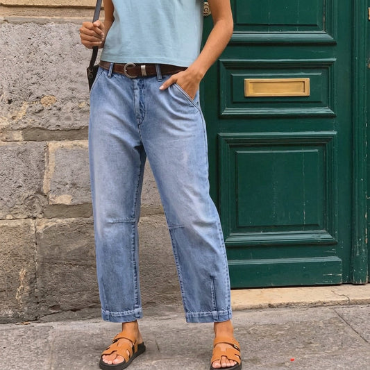 Women’s high-waisted cropped barrel jeans in light blue wash with belt loops and cuffs