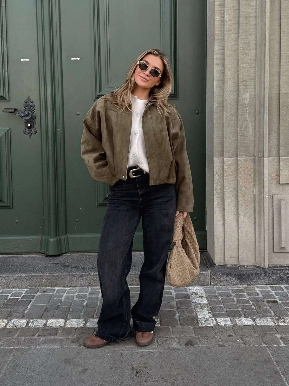 Women’s faux suede collared bomber jacket, olive green, worn with dark jeans
